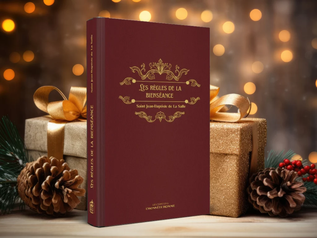 Livre Les règles de la bienséance de Jean Baptiste de la Salle posé devant un décors de Noël